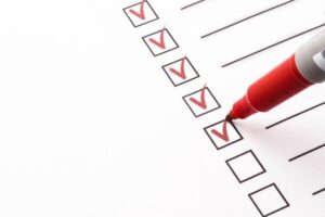 red-check-marks-on-checklist