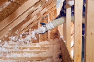 insulation-being-blown-into-an-attic